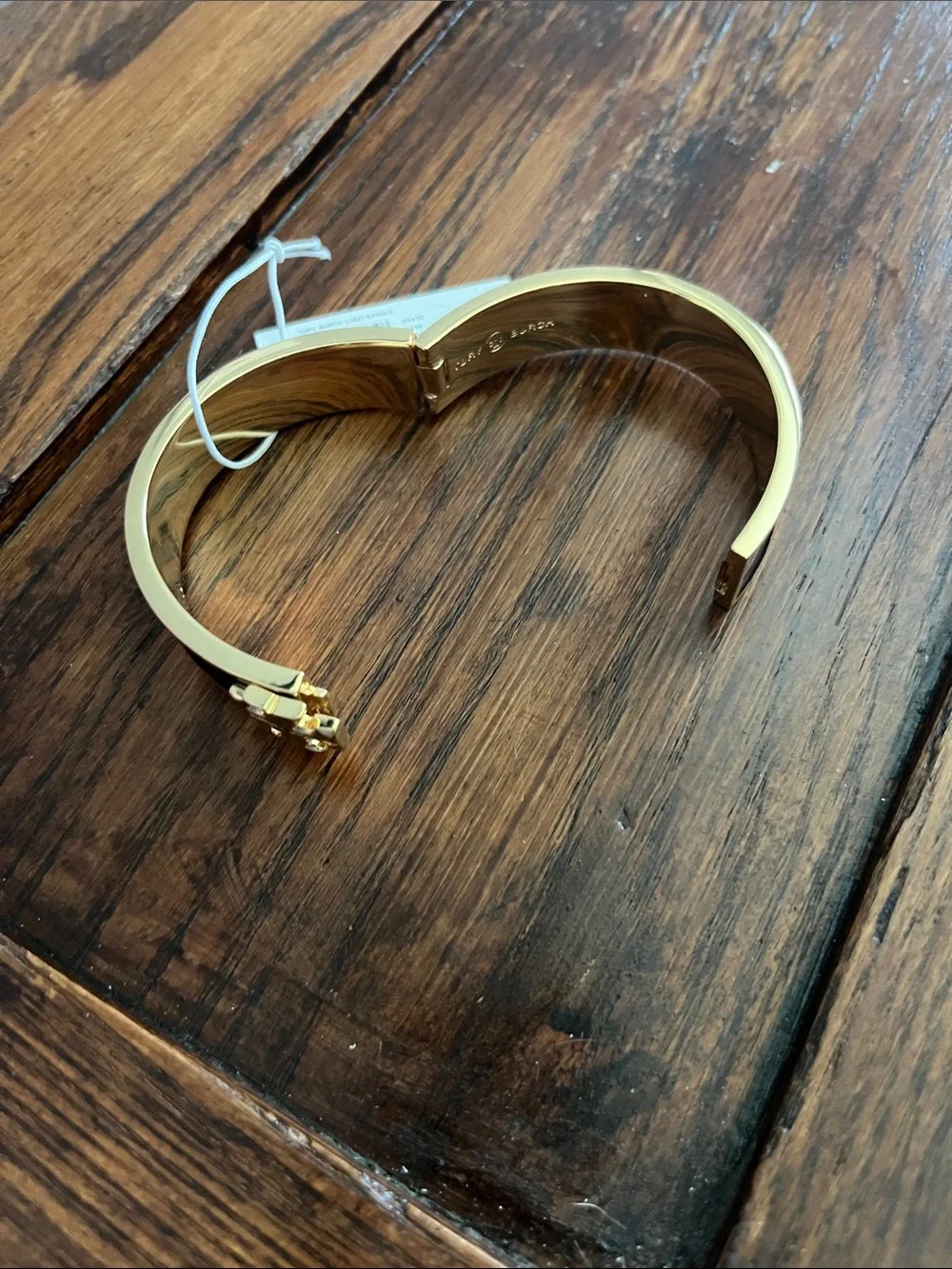 Tory Burch Black and Gold Logo Hinged Bangle